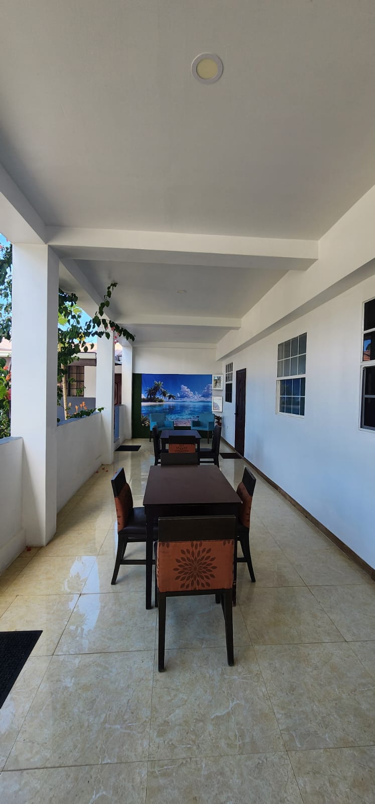 Covered terrace and apartment walkway