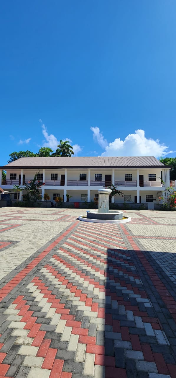 The Olympic Villas courtyard and fountain in Mayaro