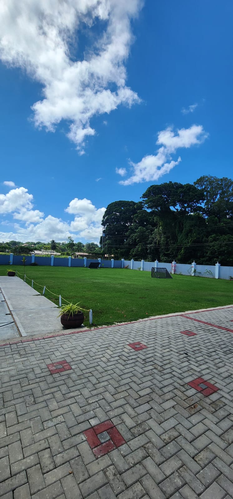 Lawn and landscaped grounds at Olympic Villas
