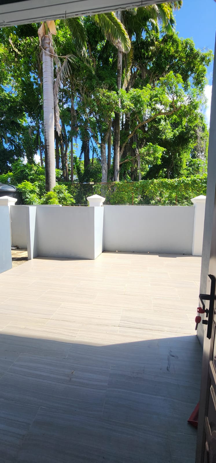 Large patio with landscaped outdoor view
